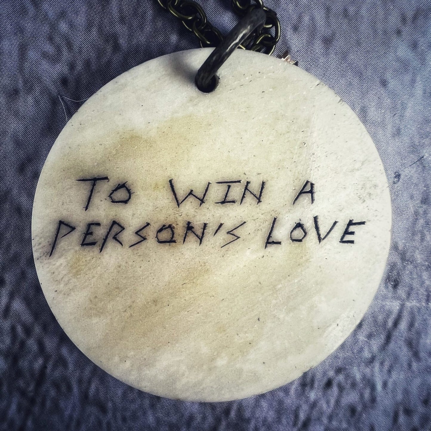 To Win a Person's Love Bone Charm Necklace
