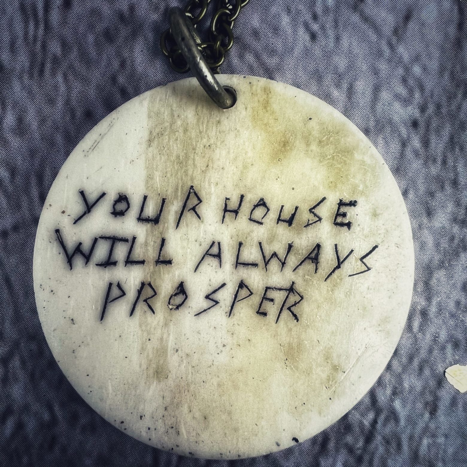 Your House Will Always Prosper Bone Charm Necklace
