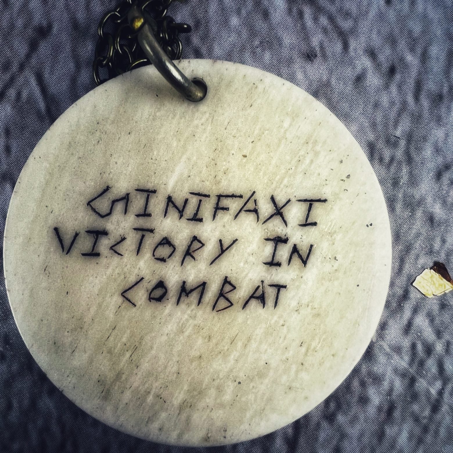 Victory in Combat Bone Charm Necklace
