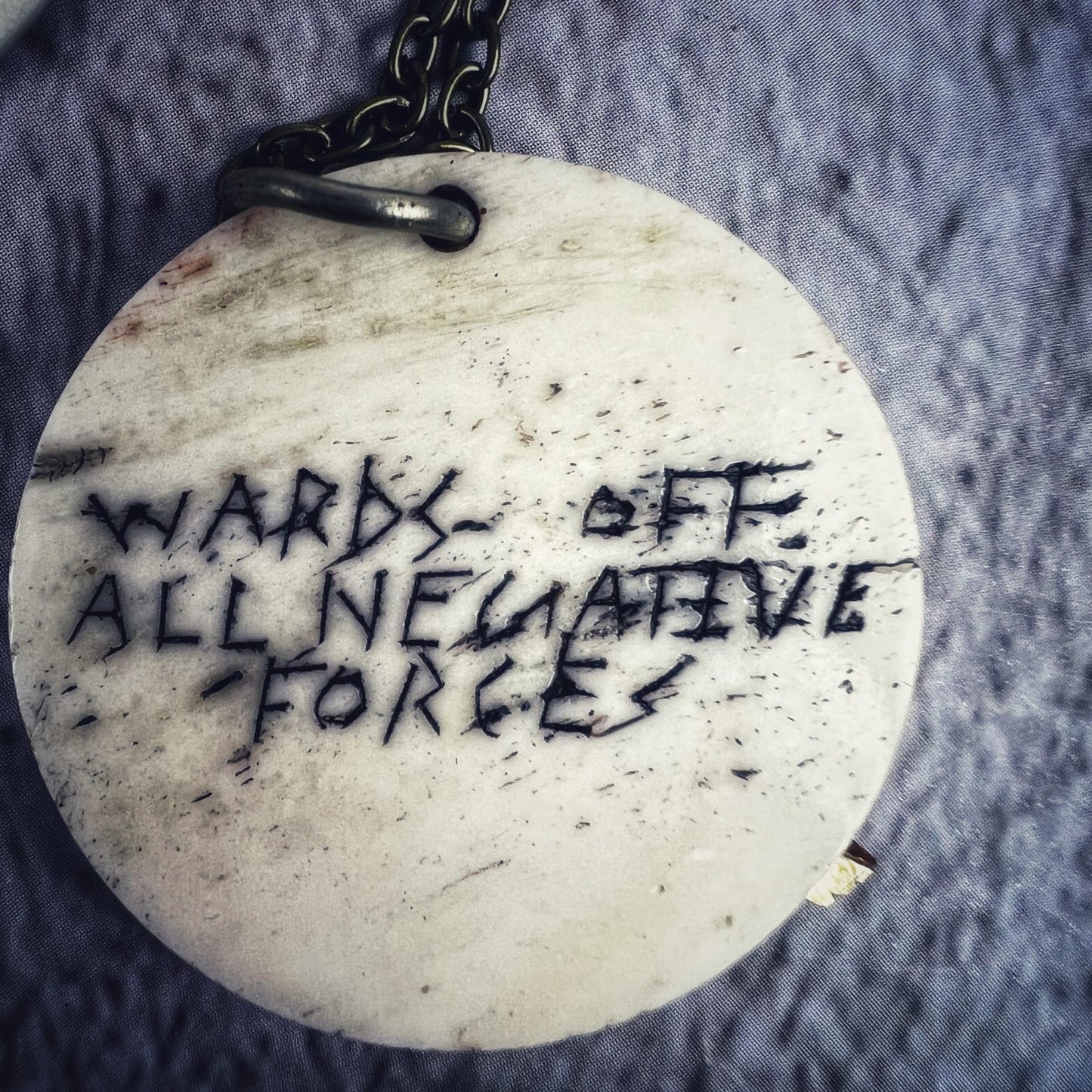 Wards Off All Negative Forces Bone Charm Necklace