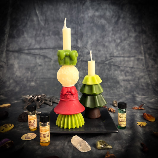 The Yuletide Wishing Candle Set is a unique, playful, and deeply magical pair of candles that you can use to cast your special intentions for the upcoming new year.