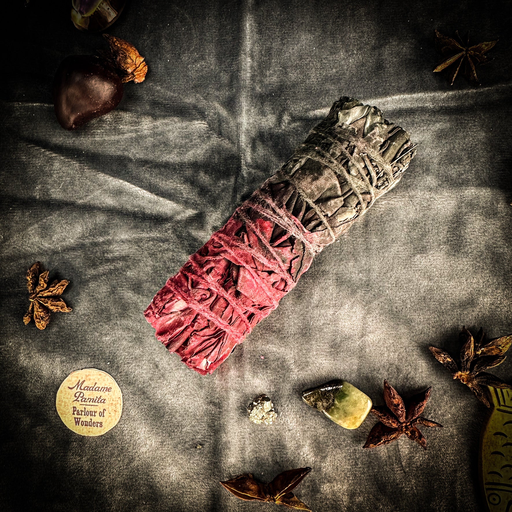 This red and black white sage smudge adds an element of color magic to your spell work. The black half is used to reverse all negativity and the red half is used to invite love.&nbsp;