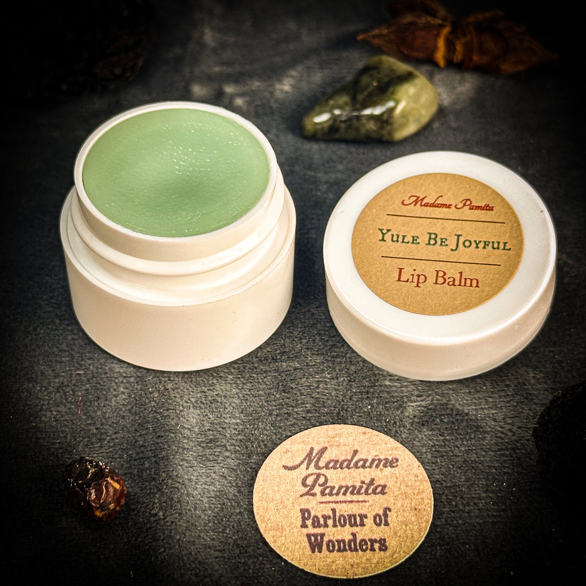 This herb and mint-flavored bewitched lip balm can be used in spells to both protect your energy and invite good times and good fun over the holidays or anytime.